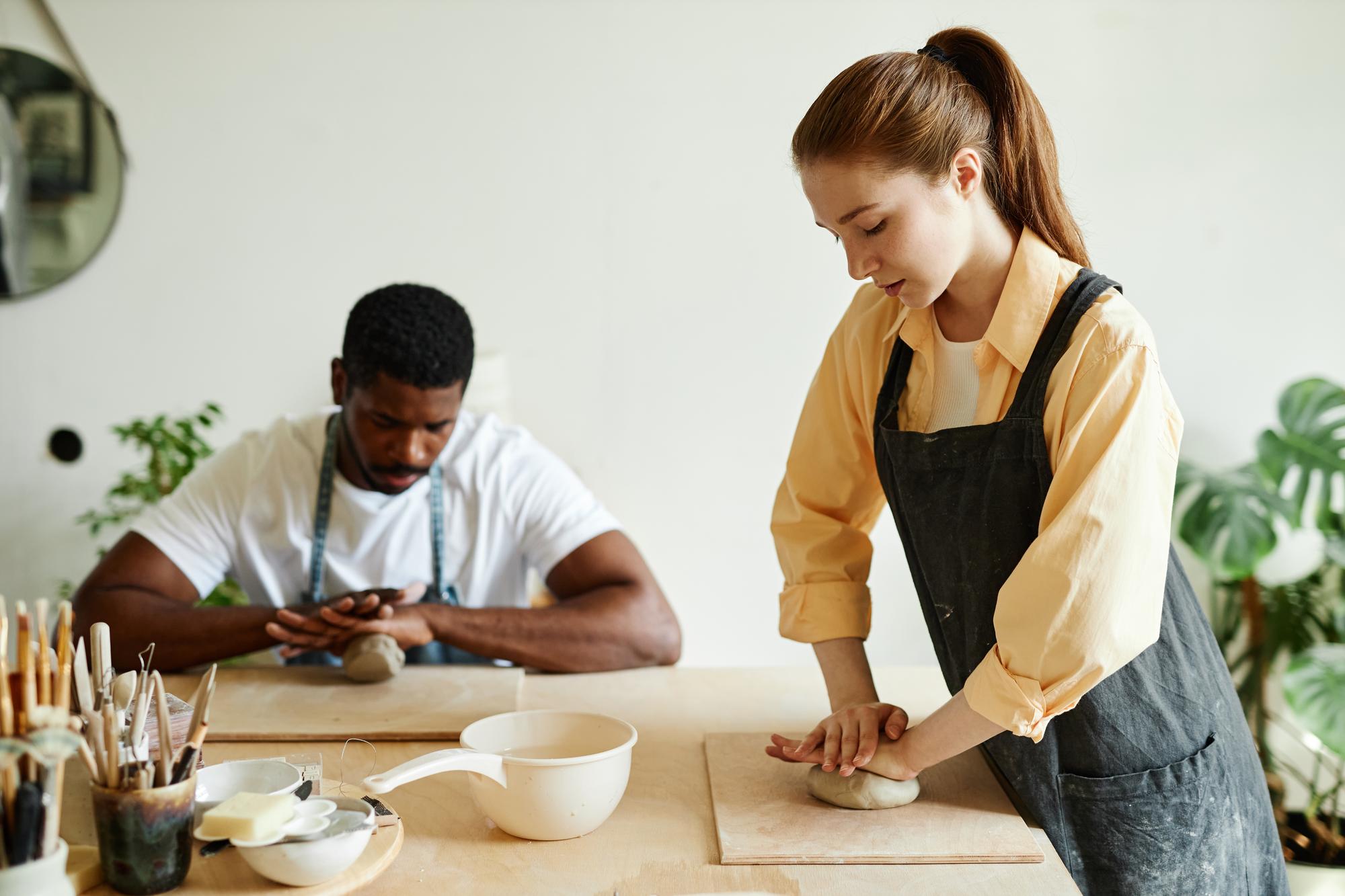 Instructor and client discussing a plated dish